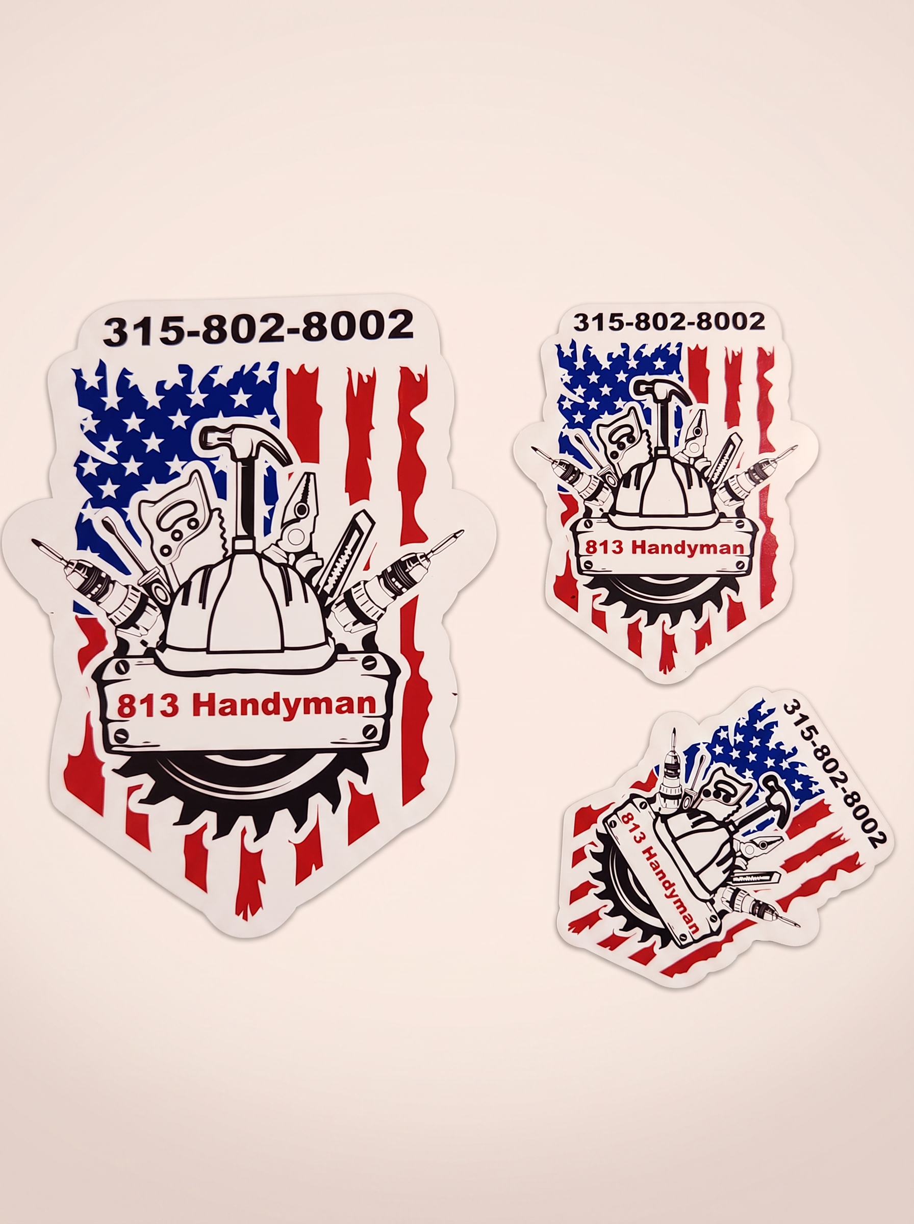 Die-cut custom business logo stickers in three sizes